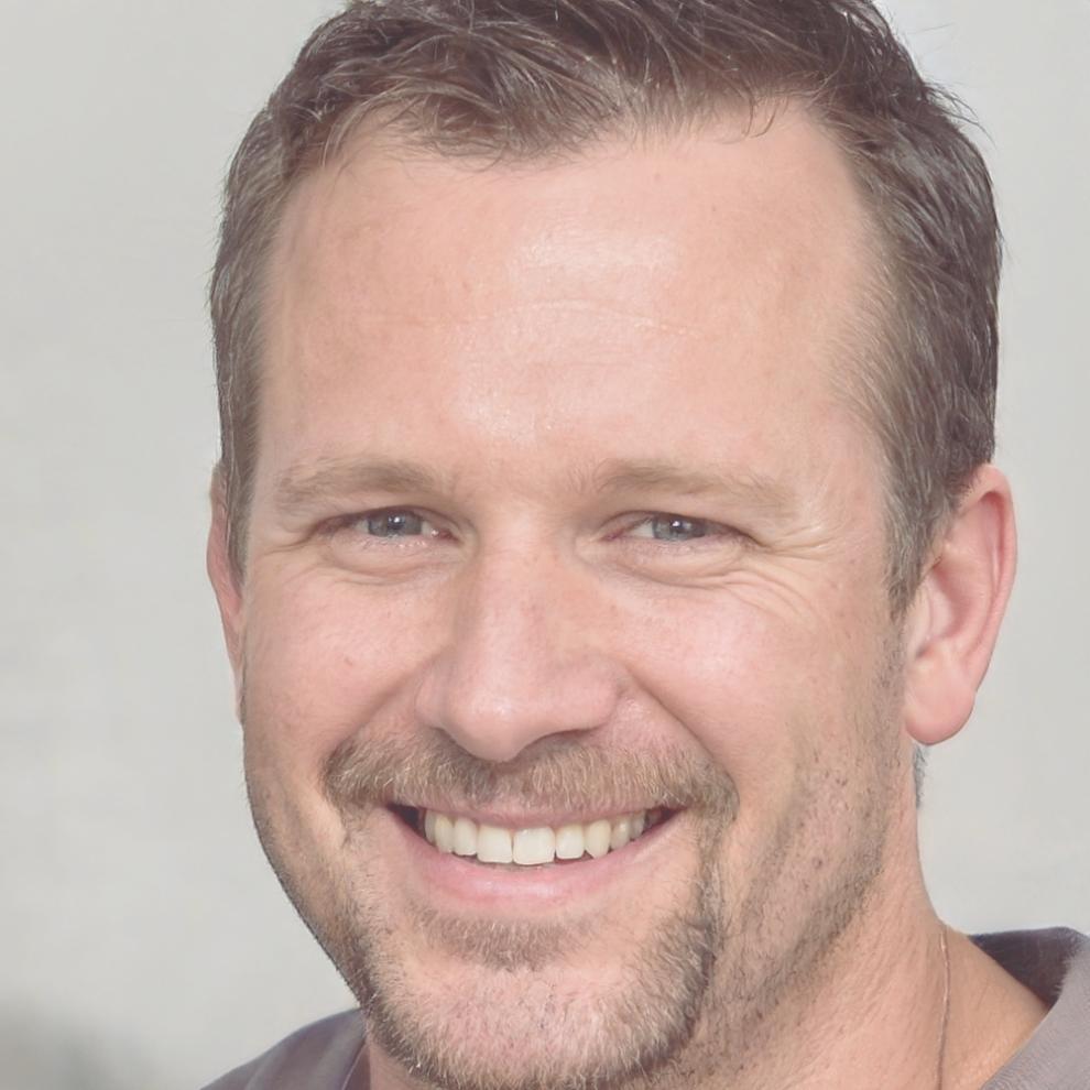 Professional headshot of business owner